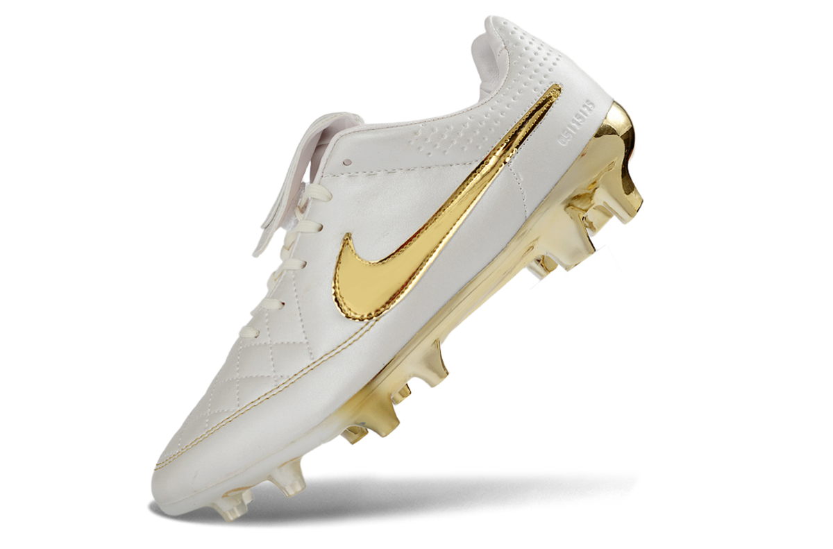 Nike Tiempo R10 branca com dourado