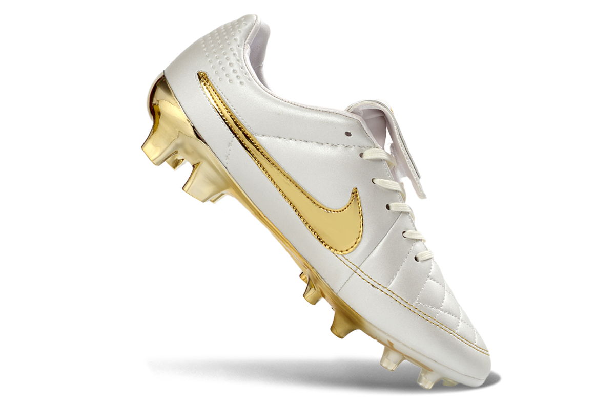 Nike Tiempo R10 branca com dourado