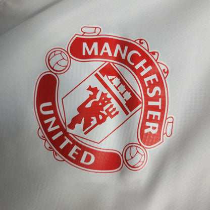 Jaqueta Corta-Vento Manchester United 23/24 - Branca