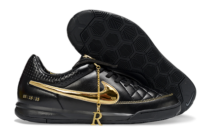 Nike Tiempo R10 preta com dourado