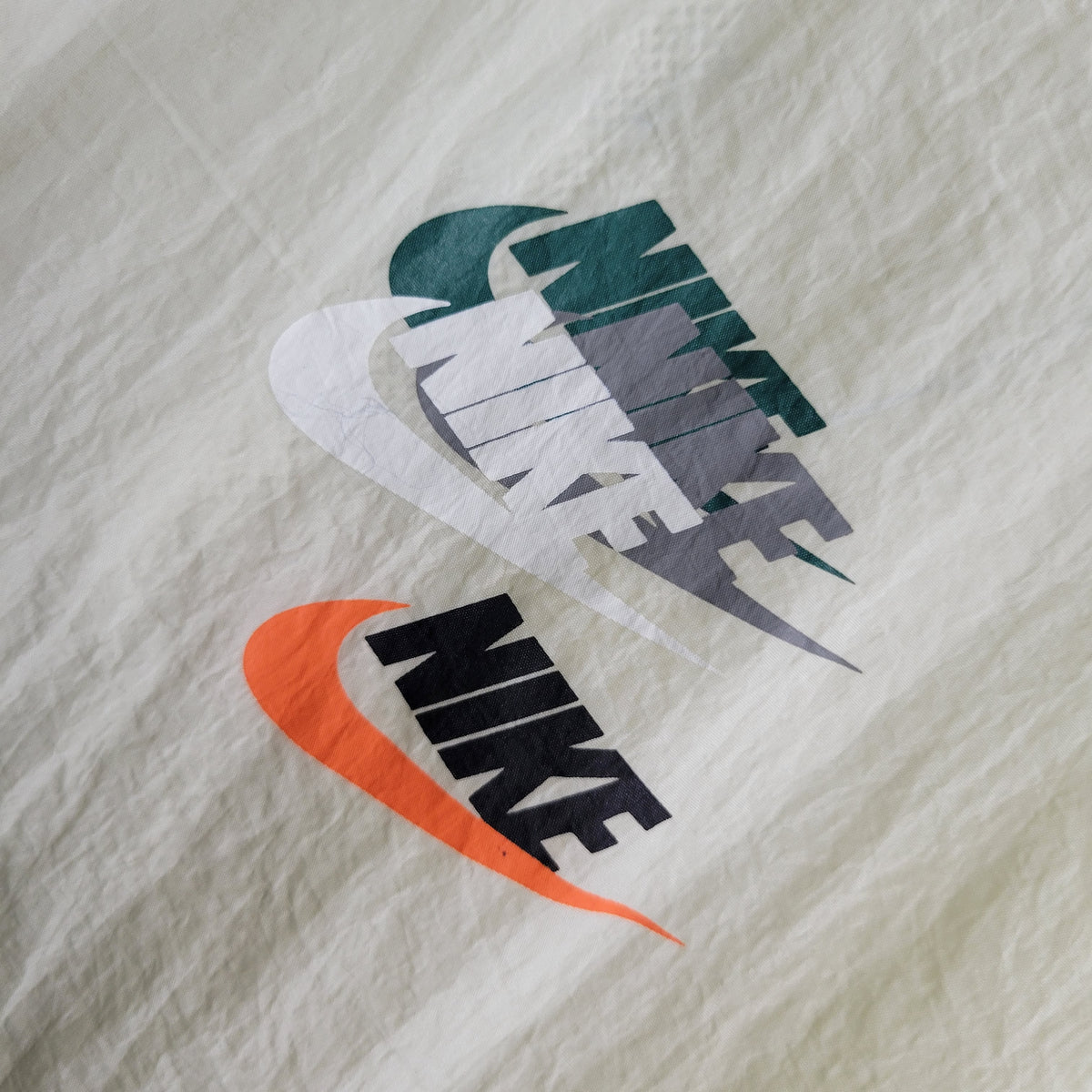Jaqueta Corta-Vento Nike 23/24 - Bege e Azul